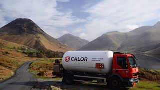 Calor Bulk truck parked in the foreground of the image, with the Lake District hills in the background