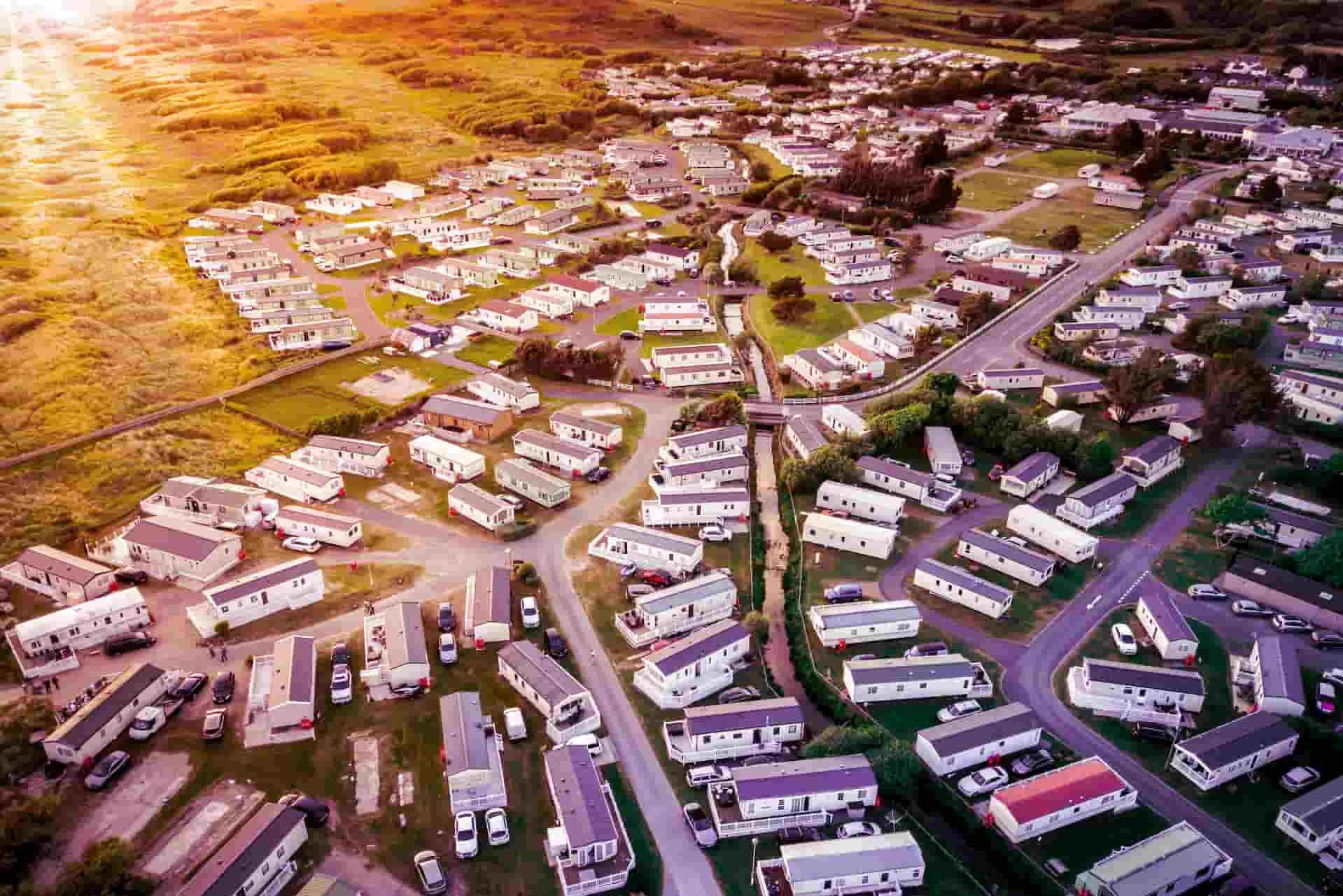 bird eye view of holiday park in the UK with sunsetting in the distance