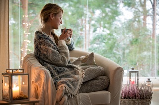 Woman relaxing and drinking tea