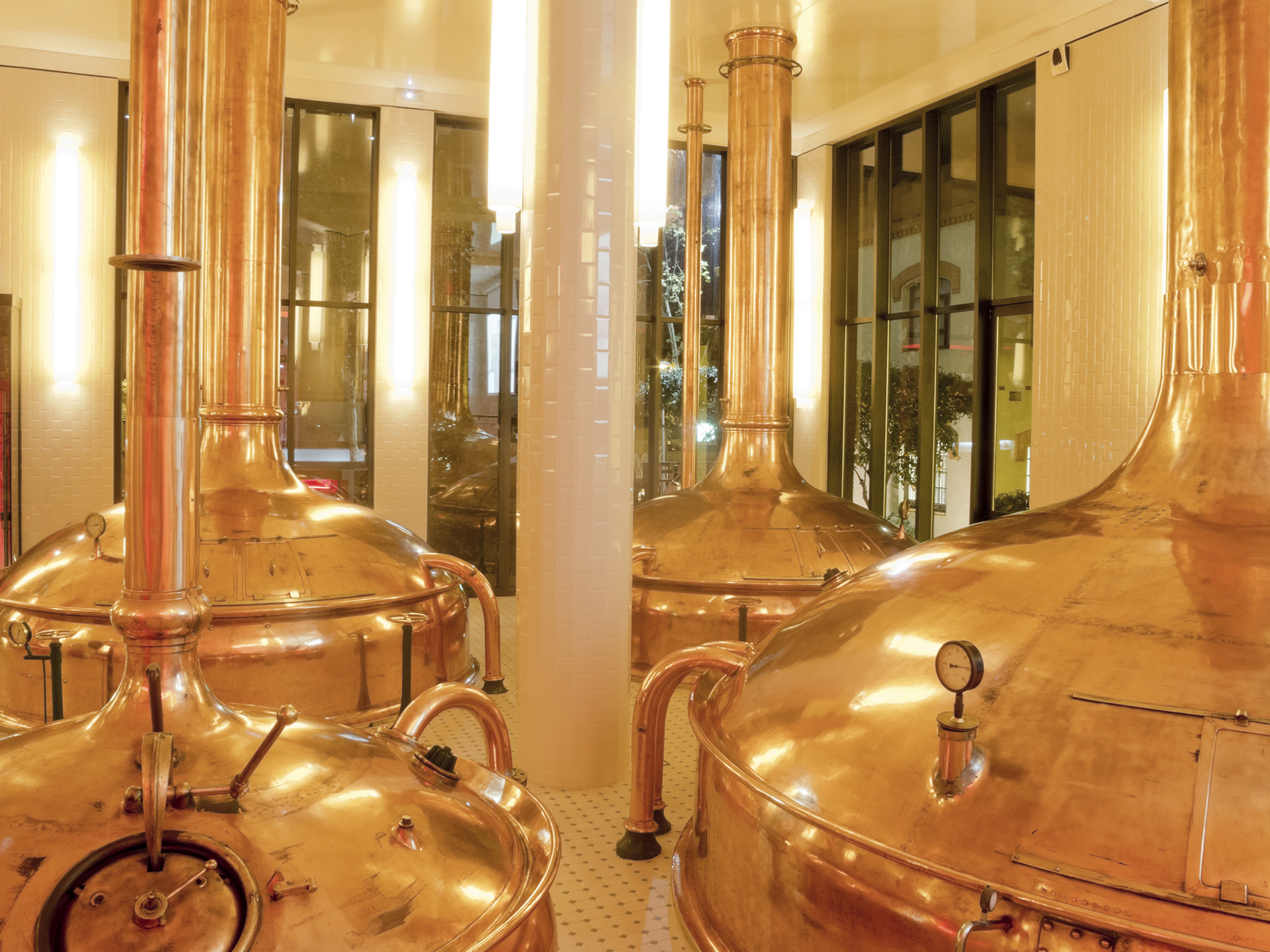 Brewery with copper distillery tanks